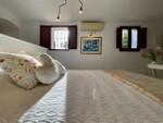 Habitacion blanca cama sol.jpeg