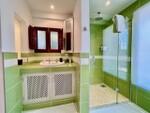 Habitacion verde ba&ntilde;o ducha.jpeg