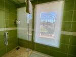 Habitacion verde ducha.jpeg